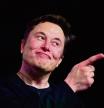 (FILES) In this file photo taken on March 14, 2019, Tesla CEO Elon Musk speaks during the unveiling of the new Tesla Model Y in Hawthorne, California. - Elon Musk's decision to pull Twitter off the stock market allows him to make major changes quickly, but it also takes the company more heavily into debt, a risky choice for a money-losing business. (Photo by Frederic J. BROWN / AFP)