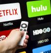 Canton, GA, USA - October 4, 2015 Netflix, hulu, and hbo subscription streaming video service accessed through a Apple tv and displayed on a hd tv.  These application are paid services popular with cable cutters as an alternative to paying for cable.