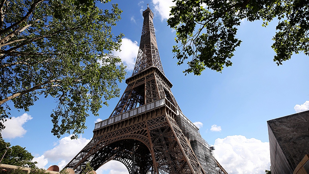 The 300-meter-high Eiffel Tower was inaugurated in 1889 and is a symbol of French culture Photo Archive 