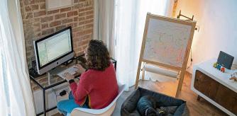 A woman doing telecommuting at home